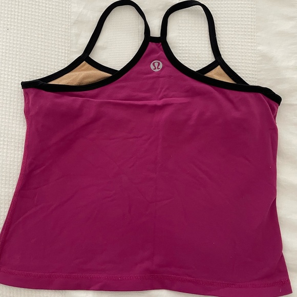 An assortment of Lululemon workout tops - Size 8 - Picture 4 of 8